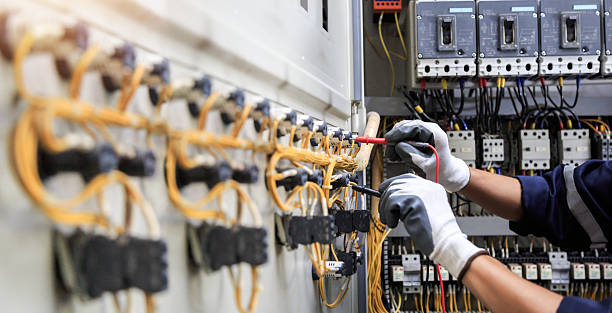 Professional Electrician technician working in Lenexa, KS